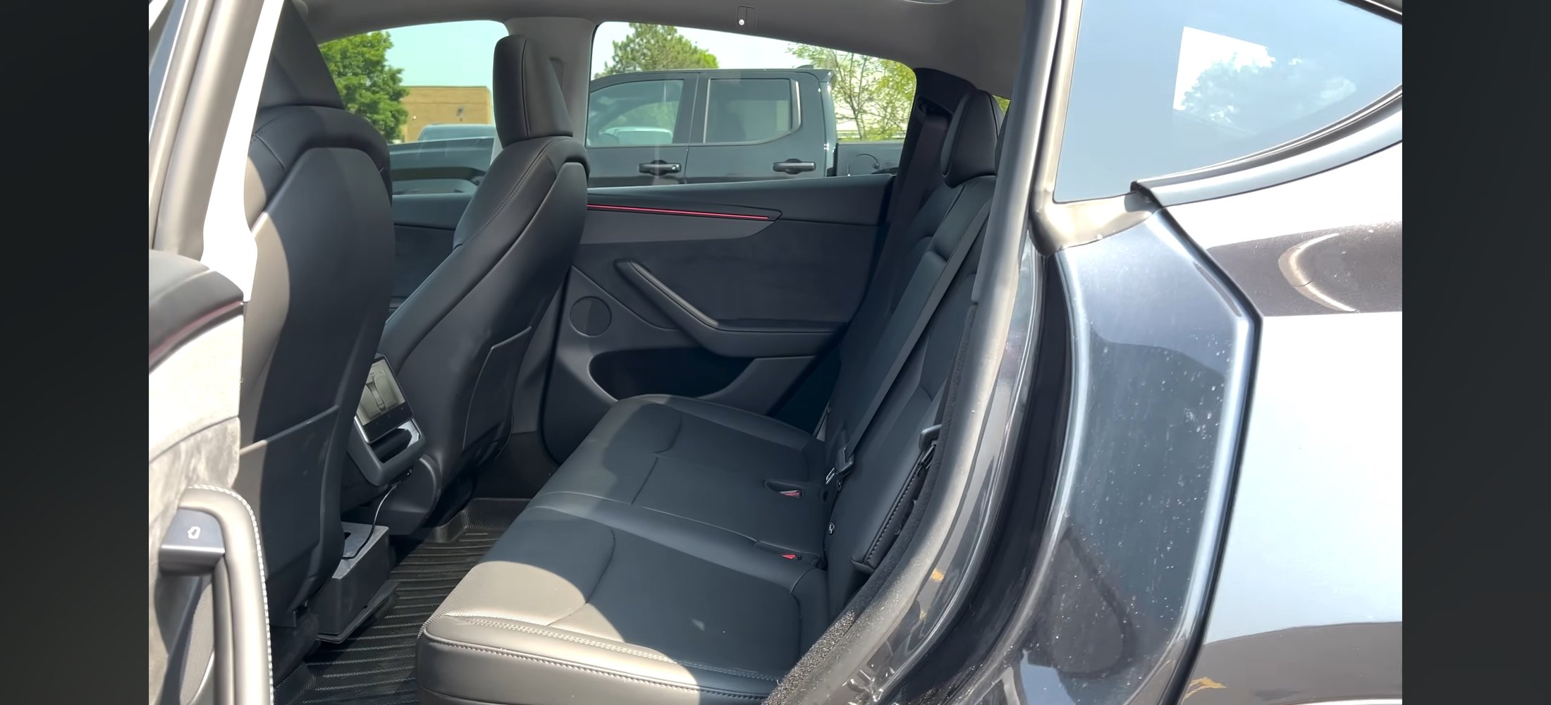 Rear seats of the Luxe Ride PHX Tesla Model Y