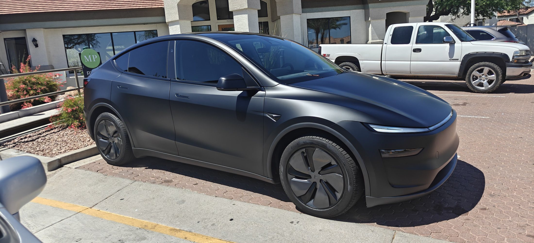 Sleek side profile of a refreshed Tesla Model Y